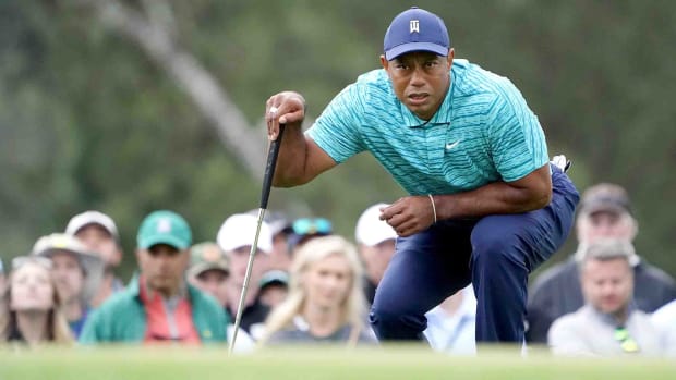 Tiger Woods stares down a putt during the second round of the 2022 Masters.